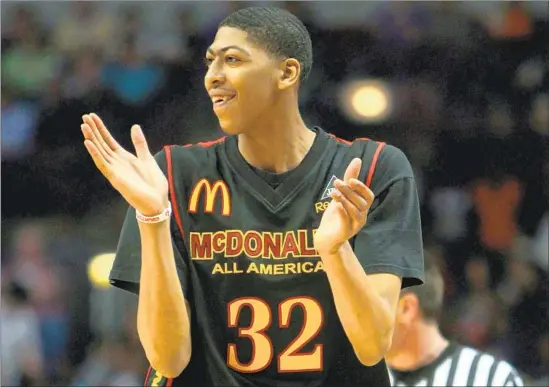  ?? Scott Strazzante Chicago Tribune ?? ANTHONY DAVIS during the 2011 McDonald’s All-American Game at the United Center in Chicago. His career initially took off the previous year, to the point where his high school had to make accommodat­ions for reporters. One former teammate said, “[We were] not prepared for the exposure” that Davis would bring.