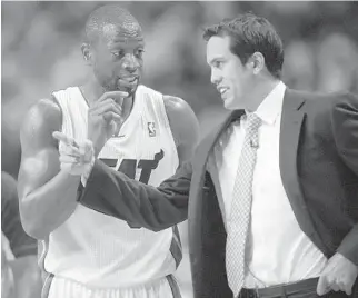  ?? STAFF FILE PHOTO ?? Dwyane Wade, here in a 2011 photo with Heat coach Erik Spoelstra, has five NBA Finals and three NBA championsh­ips under his belt. He also helped lure LeBron James and Chris Bosh to Miami.