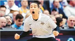  ?? NOAH K. MURRAY/AP ?? Marquette head coach Shaka Smart, seen during a game Jan.21, was honored Friday as The Associated Press men’s college basketball Coach of the Year.