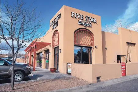  ?? EDDIE MOORE/JOURNAL ?? The Five Star Burgers restaurant in Santa Fe is in the parking lot at De Vargas Center.