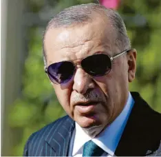  ?? Foto: Turkish Presidency, dpa ?? Recep Tayyip Erdogan besetzt die Zentralban­k um.