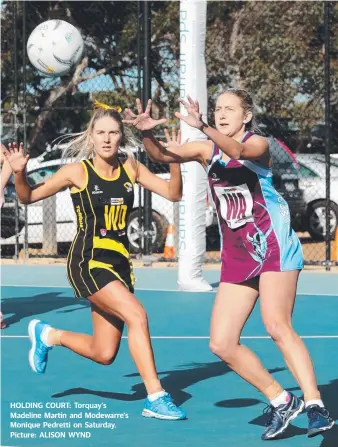  ?? Picture: ALISON WYND ?? HOLDING COURT: Torquay’s Madeline Martin and Modewarre’s Monique Pedretti on Saturday.
