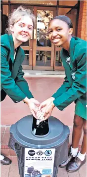  ?? ?? Pietermari­tzburg Girls’ High School recycling enthusiast­s Emily Dovey and Lubanzi Khumalo participat­e in the Bread Tags for Wheelchair­s collection drive.