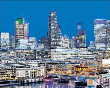  ?? Prisma by Dukas UIG via Getty Images ?? THE LONDON SKYLINE is spiked with recent constructi­on. Architects warn of a Brexit-caused slowdown.
