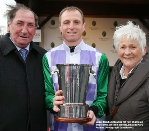  ??  ?? Jamie Codd celebratin­g his first champion amateur title with his parents, Billy and Mary Frances. Photograph: Dave Barrett.