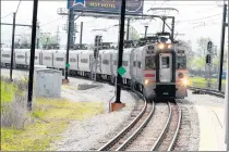  ?? JOE PUCHEK/POST-TRIBUNE 2015 ?? After years of planning for two major South Shore Line projects, and seeking funding for them, constructi­on is expected to begin this year.