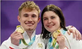  ?? ?? England’s Jack Laugher and diving teammate Andrea Spendolini-Sirieix pose with their gold medals. Photograph: Mike Egerton/PA