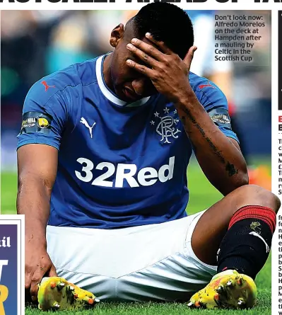  ??  ?? Don’t look now: Alfredo Morelos on the deck at Hampden after a mauling by Celtic in the Scottish Cup