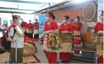  ?? Photo: AFP ?? An internatio­nal visitor is welcomed with a kahoa (garland) by Tonga Ministry of Tourism staff upon arriving at Fua'amotu Internatio­nal Airport in Tonga on August 1, 2022.