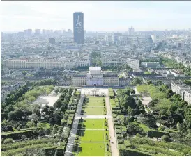  ?? FRANCK FIFE ?? Paris, a proposed host city for the 2024 Summer Olympic Games has suggested the Champs de Mars park as a venue for beach volleyball. The Internatio­nal Olympic Committee is considerin­g breaking tradition by choosing host cities well before the seven...