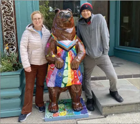 ?? PHOTO COURTESY OF BEAR FEVER ?? A new Boyertown Bear sculpture, Juju, was recently installed at Firefly Café in Boyertown. From left are artist Susan Biebuyck and Firefly Café co-owner Michael Martinez.