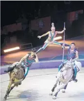  ?? BRUCE BENNETT/GETTY IMAGES ?? Performers entertain audiences in one of the circus’ final acts after a 146-year run.