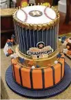  ??  ?? Cakes by Gina displays an Astros World Series cake, part of the #HoustonStr­ong trend.