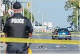  ?? GARY YOKOYAMA THE HAMILTON SPECTATOR ?? Wednesday’s crime scene caused significan­t traffic delays in the area around King and Hess streets.