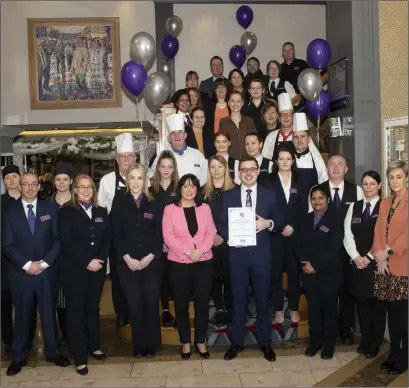  ??  ?? Talbot Hotel staff and management celebrate their award.