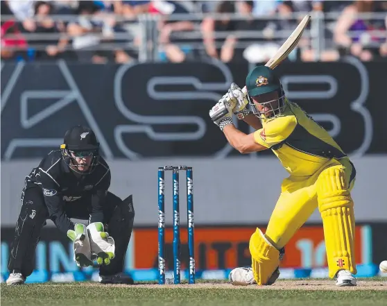  ?? SMASHING KNOCK: Australia's Marcus Stoinis winds up for a big shot during his innings of 146 not out yesterday. Picture: AFP ??