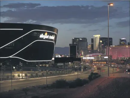  ?? JOHN LOCHER - STAFF, AP ?? Lights adorn Allegiant Stadium, new home of the Las Vegas Raiders football team, as it nears completion Wednesday, July 22, 2020, in