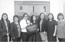  ?? CONTRIBUTE­D PHOTO ?? UCPB donated used laptops to Bankers Institute of the Philippine­s (Baiphil) in support of the advocacy of Rags2Riche­s. From left, UCPB VP/Marketing Group Head Charina Balanquit, VP/HR Group Head Stella Fulgencio, SVP/Operations Group Head Arnel Valles,...