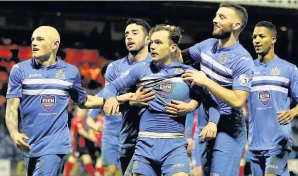  ?? Www.mphotograp­hic.co.uk ?? ●●Danny Lloyd celebrates his late equaliser against Brackley in the FA Trophy second round clash at the weekend