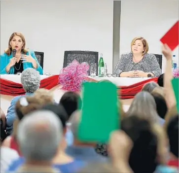  ?? Allen J. Schaben Los Angeles Times ?? ASSEMBLYWO­MAN Sharon Quirk-Silva (D-Fullerton), left, and Rep. Linda Sanchez (D-Whittier) appear at a town hall held by liberal activists in the district of Rep. Ed Royce (R-Fullerton), who did not attend.