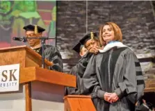  ?? LACY ATKINS/THE TENNESSEAN VIA AP ?? President Frank Sims and Chairwoman of the Board of Trustees Barbara Bowles present House Minority Leader Nancy Pelosi with an honorary degree during Fisk University’s graduation ceremony Monday at the Temple Church in Nashville.