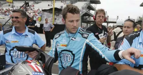  ?? MICHAEL CONROY/THE ASSOCIATED PRESS FILE PHOTO ?? “Marco (Andretti, centre) always runs strongly at Indy. I expect he will do that here again,” says racing legend and ABC/ESPN analyst Scott Goodyear.