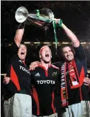  ?? SPORTSFILE ?? Munster’s Donncha O’Callaghan, Paul O’Connell and Alan Quinlan celebrate with the Heineken Cup in 2008 – a victory Keith Earls (right) didn’t feel a part of