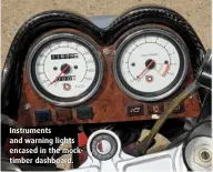  ??  ?? Instrument­s and warning lights encased in the mocktimber dashboard.