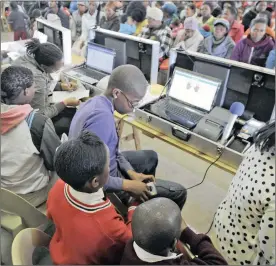  ?? PHOTO: HENK KRUGE ?? Social grants administra­tors and beneficiar­ies at the Wallaceden­e Hall, Cape Town. ILO says about 70 percent of incomes for the poorest households are from social grants.