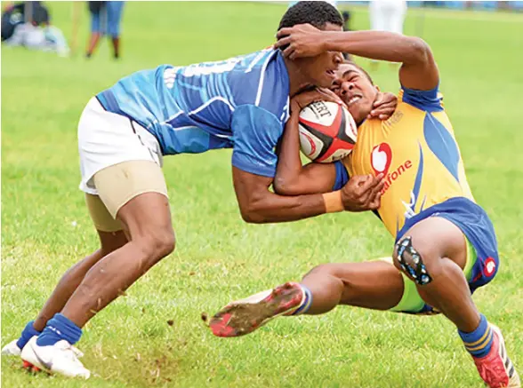  ?? Photo: Ronald Kumar ?? Asesela Tagicakiba­u of Suva Grammar School Under-16 side cops a tackle against Nasinu Secondary in the Vodafone Southern Zone playoffs at Bidesi Park, Suva ,on July 13, 2019..
