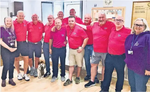  ?? ?? In the pink Funky Natz Foundation committee members at Wishaw Golf Club with representa­tives from Epilepsy Scotland