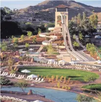  ??  ?? Slide Canyon Tower at Oasis Water Park is eight stories high, making it one of the park’s most popular attraction­s.