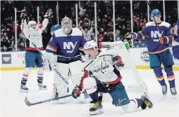  ?? FRANK FRANKLIN II THE ASSOCIATED PRESS ?? Washington Capitals’ Alex Ovechkin celebrates after scoring a goal during the third period Saturday. Ovechkin scored three goals as the Capitals won, 6-4.