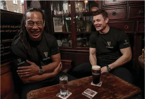  ?? INPHO ?? All Black together: Brian O’Driscoll and Tana Umaga were re-united in Dublin ahead of Ireland’s Guinness Series clash against New Zealand as part of Guinness’s #AnswerIrel­andsCall campaign. Below: Screengrab­s show the infamous spear tackle on O’Driscoll by Umaga and Keven Mealamu during the 2005 Lions tour