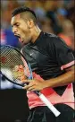  ?? SPENCER / GETTY IMAGES CAMERON ?? Nick Kyrgios celebrates set point in his third-round, four-set victory against Jo-Wilfried Tsonga.