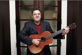  ?? PHOTO BY DONN JONES — INVISION — AP, FILE ?? In this file photo, Vince Gill poses for a photo at his home in Nashville, Tenn.