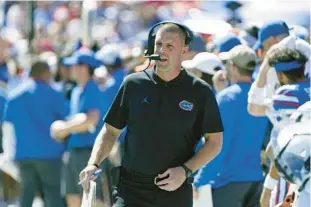  ?? JOHN RAOUX/AP ?? Florida coach Billy Napier is 11-14 in two seasons, but the resources are in place for him to turn around the Gators.