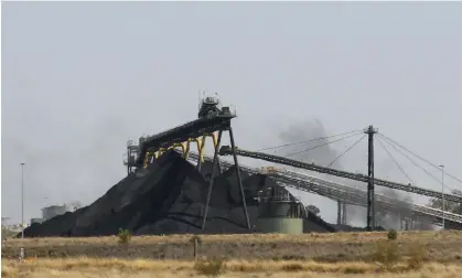  ?? Photograph: Rob Griffith/AP ?? File photo of coal stacked at a Whitehaven Coal mine outside Narrabri, NSW. Neither major party says it has any plans to capitalise on record coal prices.