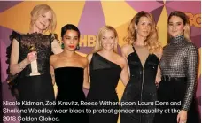  ??  ?? Nicole Kidman, Zoë Kravitz, Reese Witherspoo­n, Laura Dern and Shailene Woodley wear black to protest gender inequality at the 2018 Golden Globes.