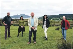  ?? 01_B20solar01_23_glenkiln_renewables ?? Chairman Donald McNicol, centre, on the 20-acre site proposed for the first community owned solar farm above Lamlash with left to right: Kenneth Bone, Helen Ross, Esther Brown and Gavin Steven. Founding director Chris Grainger and Jude King were unable to make the photocall.