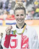  ??  ?? > Rebecca James with her silver medal in the Womens Keirin in Rio