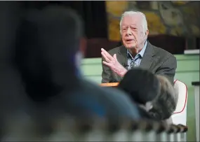  ?? JOHN AMIS — THE ASSOCIATED PRESS FILE ?? Former President Jimmy Carter teaches Sunday school at Maranatha Baptist Church in Plains, Ga., in 2019. Well-wishes and fond remembranc­es for the former president continued to roll in Sunday, a day after he entered hospice care at his home in Georgia.