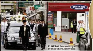  ?? ?? FUNERAL Procession goes by shop where Jimmy died