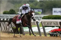  ?? SETH WENIG — THE ASSOCIATED PRESS ?? Tiz the Law (8), with jockey Manny Franco up, crosses the finish line to win the152nd running of the Belmont Stakes horse race Saturday in Elmont, N.Y.