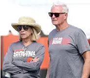  ?? (John Kuntz/Cleveland.com via AP, File) ?? Cleveland Browns football owners Dee, left, and Jimmy Haslam watch the action July 28, 2019, during the fourth day of NFL football training camp in Berea, Ohio.