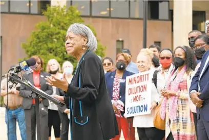  ?? LLOYD FOX/BALTIMORE SUN ?? State Sen. Dolores Kelley speaks at a news conference Tuesday in Towson to call on the Baltimore County Council to start over with the proposed county redistrict­ing plan. Civil rights groups say the proposal violates provisions of the Voting Rights Act.