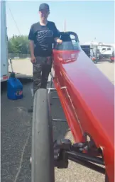  ?? CITIZEN STAFF PHOTO ?? Ethan Ochitwa stands beside his dragster on Saturday at NITRO Motorsport­s Park.