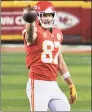  ?? Reed Hoffmann / Associated Press ?? Chiefs tight end Travis Kelce signals a first down after making a catch against the Bills on Sunday.
