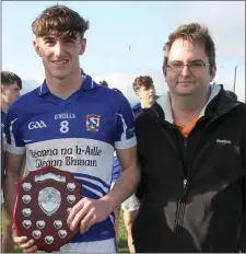  ??  ?? Team captain Tom White with Dean Goodison (People Newspapers).