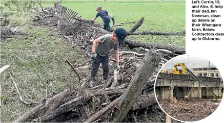  ?? ?? Left: Corrin, 10, and Alex, 6, help their dad, Ian Newman, clean up debris on their Whangara farm. Below: Contractor­s clear up in Gisborne.